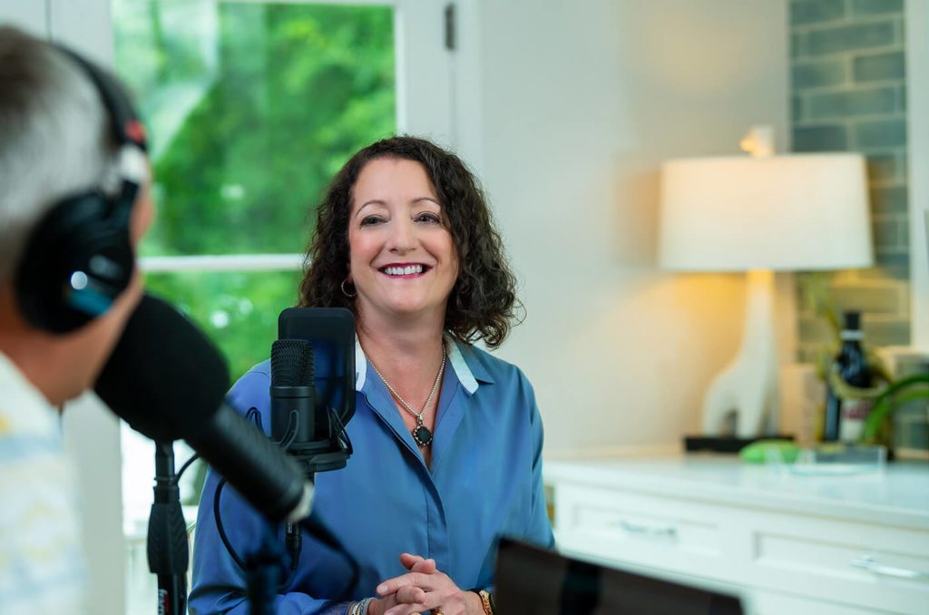 Melissa Greer being interviewed for a podcast